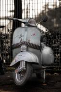 gray moped for worker