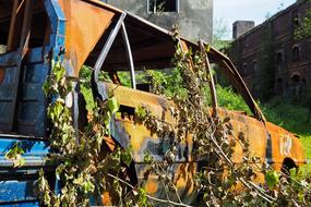 dilapidated rusty car