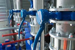 blue pipes and valves close up