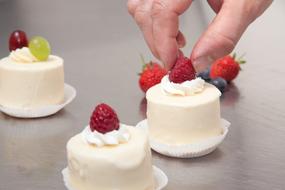Raspberries Bake and hand
