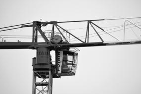 cabin of tower Crane at cloudy sky background