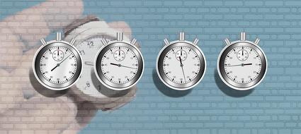 drawn four stopwatch on a brick wall background