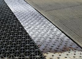 asphalt and metal bridge pavement