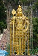 scaffolding around the golden Buddha sculpture in Malaysia
