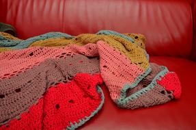 crochet blanket on sofa