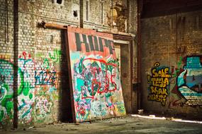 various graffiti in an abandoned factory