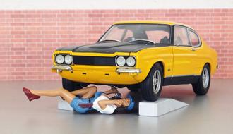girl repairs car, plastic Model