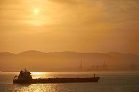 oil tanker at sunset