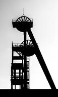 old time Headframe of coal mine, black and white