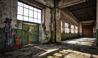 grunge walls with graffiti in empty abandoned industrial building, germany, Cologne