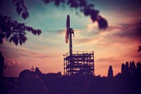 Windmill on the red evening sky