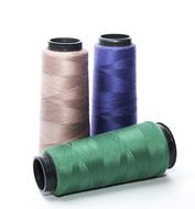 beige, blue and green threads