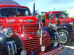 red vintage trucks parked