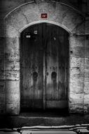 black and white photo of the door to the castle