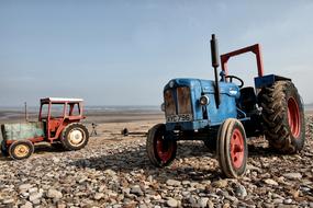 vintage pebble tractors by the sea at Saltburn-by-the-Sea