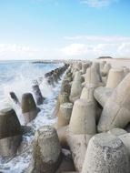 stone breakwaters on the shore of the island of Sylt