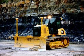 bulldozer in open pit mine