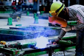 industrial welding of metal structures with protection
