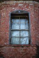 retro window on the brick facade