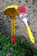 colorful bird decoration in garden