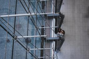 people working in contemporary office building