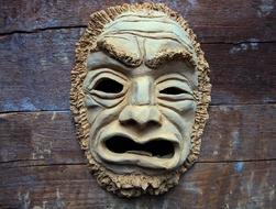 Mask Fash Art on wood wall