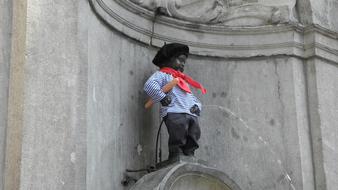 pissing boy in sailor suit as a sculpture in brussels