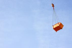 garbage in a container in the air