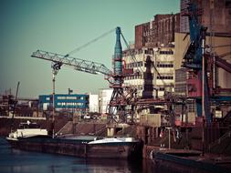 Colorful inland port with the machines and buildings in Neuss, Germany