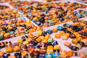 Close-up of the many, colorful and beautiful, assorted beads, with the patterns