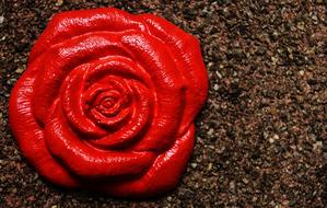 red rose from plaster