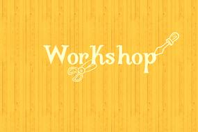 workshop on a yellow banner
