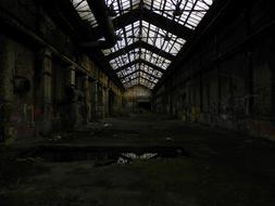 Beautiful, old, dark factory with windows, with light