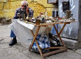 Old man seller Antiques on Street