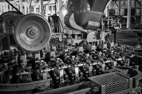 Black and white photo of the cannery with equipment