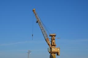 industrial crane on the background of the sky