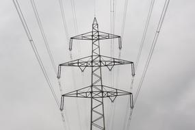 power lines against a gray evening sky