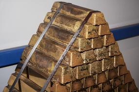 Stacks of the shiny, yellow brass bars