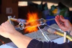 Heating glass with orange and yellow fire