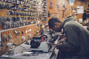 Guy Man worker in workshop