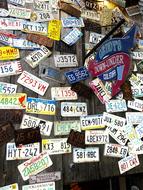 Colorful car tags with the signs, in light