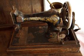 antique sewing machine on the table