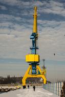 yellow crane in the harbor