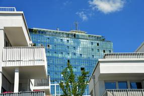 mirror reflection of the sky in the hotel facade