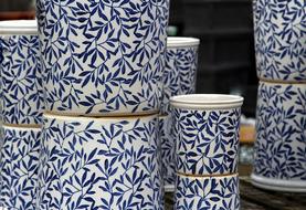 blue patterns on ceramic cups close up
