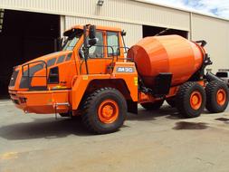 orange truck with concrete mixer