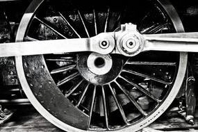 wheel of vintage railroad transport in black and white background