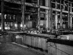 Black and white photo of an abandoned warehouse