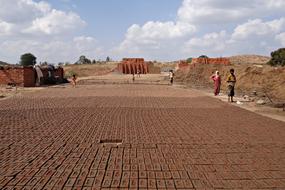 Brick-Laying worker in India