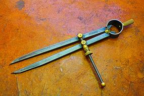 Close-up of the retro calliper, on the rusty surface